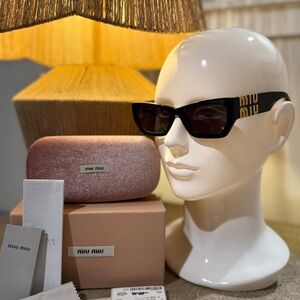 Miu Miu Black Sunglasses with Gold Accents